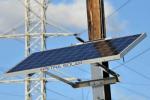 SunWave solar power systems are attached to utility poles, where they can gather sun power as well as provide a point of data gathering for utility companies to monitor the grid. | Photo courtesy Petra Solar