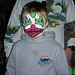 Young boy with face paint at OPM’s Annual Toy Drive