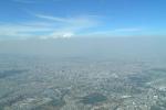 A heavy layer of air pollution, a mix of aerosol particles and vapors, obscures the view over Mexico City. Two studies by the Pacific Northwest National Laboratory show the importance of including the small-scale effects of aerosols in climate modeling. | Image courtesy of PNNL