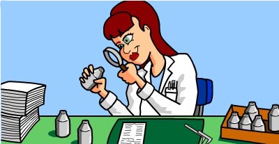 A Mint employee checking dies with a magnifying glass.