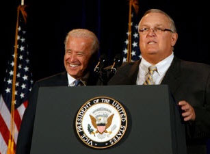 Vice President Biden and Chairman Devaney at a podium