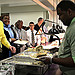 May Newsletter 5 - Office of Personnel Management employees enjoying food at the Public Service Recognition Week BBQ.