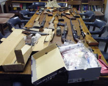 weapons seized during raid in Del Rio, TX