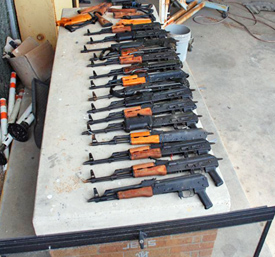 15 AK47 assault type rifles that were discovered hidden inside a pickup truck
