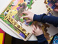 image of a child putting together a puzzle