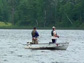 two men in a fishing boat
