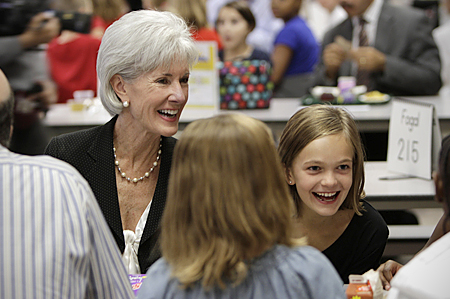 HHS Secretary Sebelius eats with children at Lowry Elementary School during an Education Drives America event in Denver, Colorado. Photo Credit: Mark T. Osler.