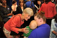 HHS Secretary Sebelius with Robyn M. and her son, Jax, at a Women’s Health Town Hall event at the White House. Credit: Photo by HHS/Michael Wilker.