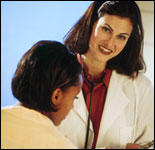 Photo: A healthcare professional with a patient.