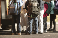 Photo: Students waiting to board school bus