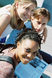 Photo: Three teenage students smiling