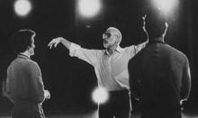 Image of choreographer Jerome Robbins rehearsing dancers.