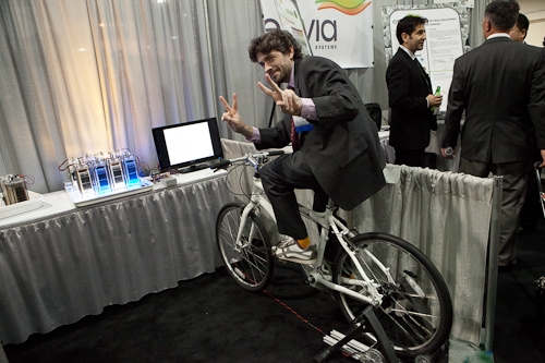 CUNY's Josh Galloway shows how the bike is able to charge their flow-assisted alkaline battery. The CUNY Energy Institute aims to demonstrate a better cycle life than lithium-ion batteries, which can be up to 20 times more expensive than Zinc-based batteries.