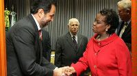 Date: 02/16/2012 Description: Governor Agnelo Queiroz shakes hands with Special Representative Reta Jo Lewis in Brazil, February 2012. - State Dept Image
