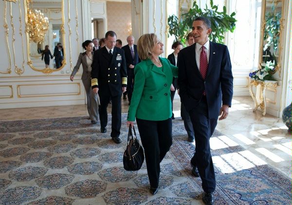 President Barack Obama talks with Secretary of State Hillary Rodham Clinton, following the expanded delegation bilateral meeting with President Dmitry Medvedev of Russia, at Prague Castle in Prague, Czech Republic, April 8, 2010.