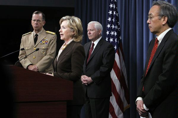 Secretary of State Hillary Rodham Clinton speaks to the press about the Nuclear Posture Review Report as from left, Chairman of the Joint Chiefs of Staff Adm. Michael Mullen, Defense Secretary Robert Gates and Energy Secretary Steven Chu, look on at the Pentagon, Tuesday, April 6, 2010. 
