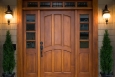 Although many people choose wood doors for their beauty, insulated steel and fiberglass doors are more energy-efficient. | Photo courtesy of ©iStockphoto/cstewart

