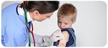 A boy gets a flu shot.