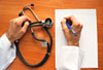 image of doctor writing prescription