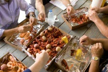 President Obama eating boiled seafood