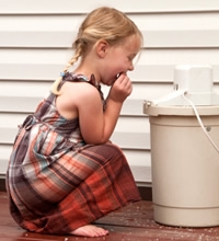 Little girl with ice cream machine.