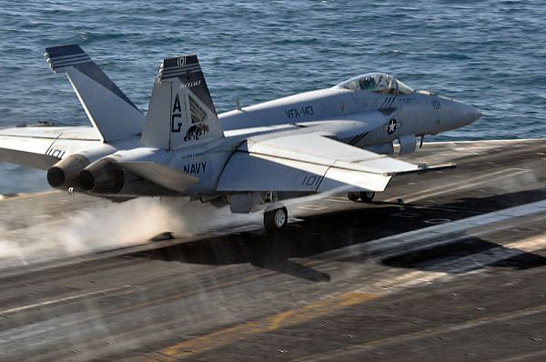 An F/A-18F Super Hornet assigned to the Pukin Dogs of Strike Fighter Squadron (VFA) 143 launches from the Nimitz-class aircraft carrier USS Dwight D. Eisenhower (CVN 69). Dwight D. Eisenhower is deployed to the U.S. 5th Fleet area of responsibility conducting maritime security operations, theater security cooperation efforts and support missions as part of Operation Enduring Freedom. The U.S. Navy is constantly deployed to preserve peace, protect commerce, and deter aggression through forward presence. Join the conversation on social media using #warfighting.  U.S. Navy photo by Lt. Adam R. Cole (Released)  121010-N-GY309-112
