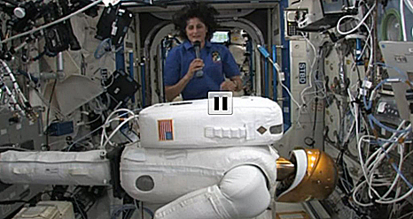 Astronaut Sunita Williams behind Robonaut 2 on the space station