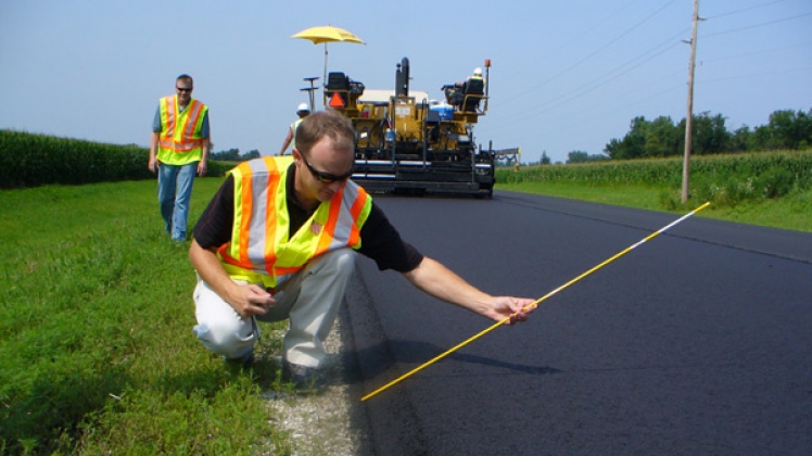 Workers along highway