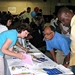 Christie Silbajoris, Director of NC Health Info, and participants at the NCHEALINFO exhibit during the annual “Fiesta del Pueblo” in Raleigh, NC.