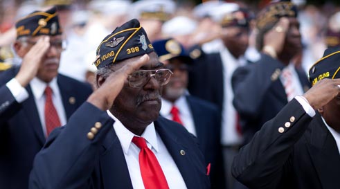 Veterans salute American flag