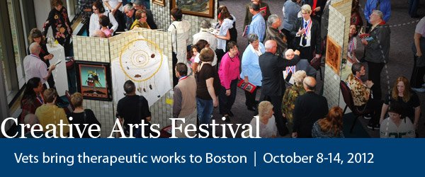Creative Arts Festival: Vets bring therapeutic works to Boston, October 8-14, 2012. Image of people looking at art in a large hall
