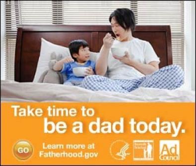 Father and daughter eating breakfast in bed