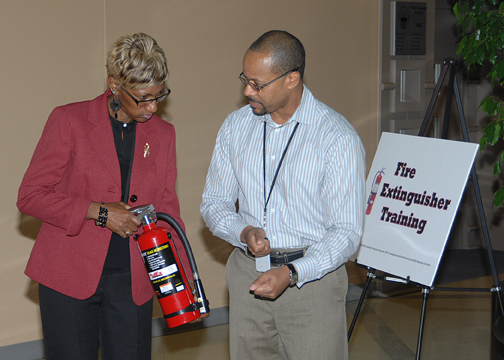 Front page image for: HQC employees practice fire safety during Fire Prevention Week