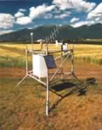 A photo of a typical AgriMet station, which uses solar powered batteries to collect and transmit weather data.