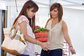 students at farmer's market shopping