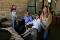 President George W. Bush and Mrs. Laura Bush relax with their daughters, Barbara and Jenna, August 24, 2004, during an interview for People Magazine at Prairie Chapel Ranch in Crawford, Texas. (P42733-170)