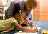 Father working with daughter