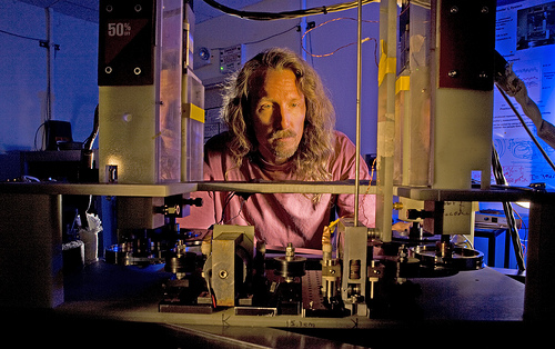 Scientist checks tapes for uniformity