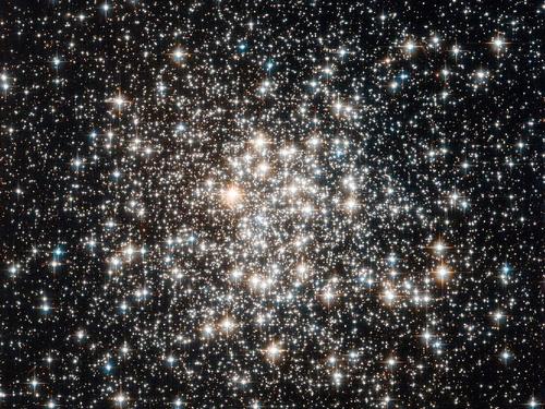 Image description: The Hubble Space Telescope captured a crowd of stars that looks rather like a stadium darkened before a show, lit only by the flashbulbs of the audience’s cameras. Learn more about these stars.
Photo by ESA/NASA