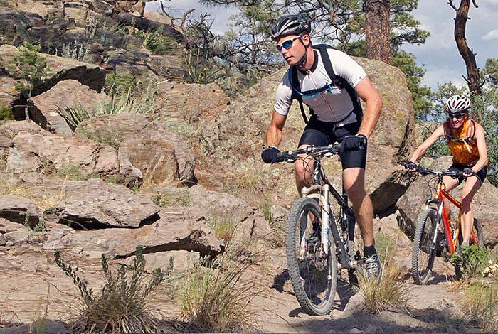 Bikers (and LANL Postdocs) Brent and Pam in Los Alamos canyon riding hard on the trail