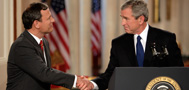 President George W. Bush shakes hands with Supreme Court Justice Nominee John Roberts after his remarks on the State Floor of the White House, July 19, 2005. (P071905ED-0841)