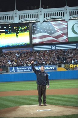 President George W. Bush gives a thumbs-up, October 30, 2001, as he stands on the mound at Yankee Stadium before throwing out the ceremonial first pitch in Game Three of the World Series between the Arizona Diamondbacks and the New York Yankees in New York City.   (P9154-07)