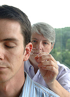 A doctor performing acupuncture.