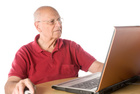 Senior using a laptop. - Click to enlarge in new window.