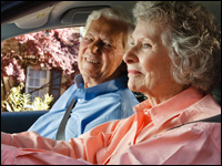 Photo: A senior couple in a car.