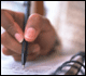 Image of writer with pen
