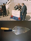 President Gerald Ford lays the cornerstone for the current Department of Labor headquarters building in 1974. Also pictured is one of the ceremonial trowels used during the ceremony that was returned to the department in 2007 by a member of the public who found it among a box of tools inherited from a relative. Click on the image for a larger version.