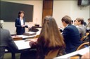 Kathleen McChesney became the first woman to attain the rank of executive assistant director after being named the head of Law Enforcement Services in December 2001. McChesney, shown here teaching a new agents class at the FBI Academy, became an agent in August 1978 and rose through the ranks as an investigator, supervisor, and manager in both the field and at Headquarters. She retired in November 2002. Today, the FBI employs more than 15,000 women, with over 2,600 serving as special agents. Visit FBIJobs.gov for the latest openings and more information on Bureau careers.