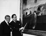 Image: Benefactor Chester Dale (left) joins surrealist artist Salvador Dali in presenting his Sacrament of the Last Supper to the National Gallery of ArT