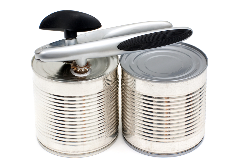 Close up of canned food items and manual can opener
